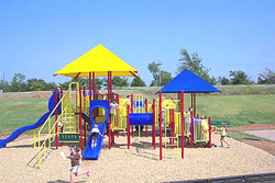 shade mounted to playground equipment