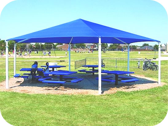 Playground shades :: This hexagon playground shade structure and canopy covers this picnic area.