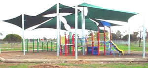 Playground shades :: Sail shade structures and canopies offer extensive sun protection and a futuristic look to your playground.